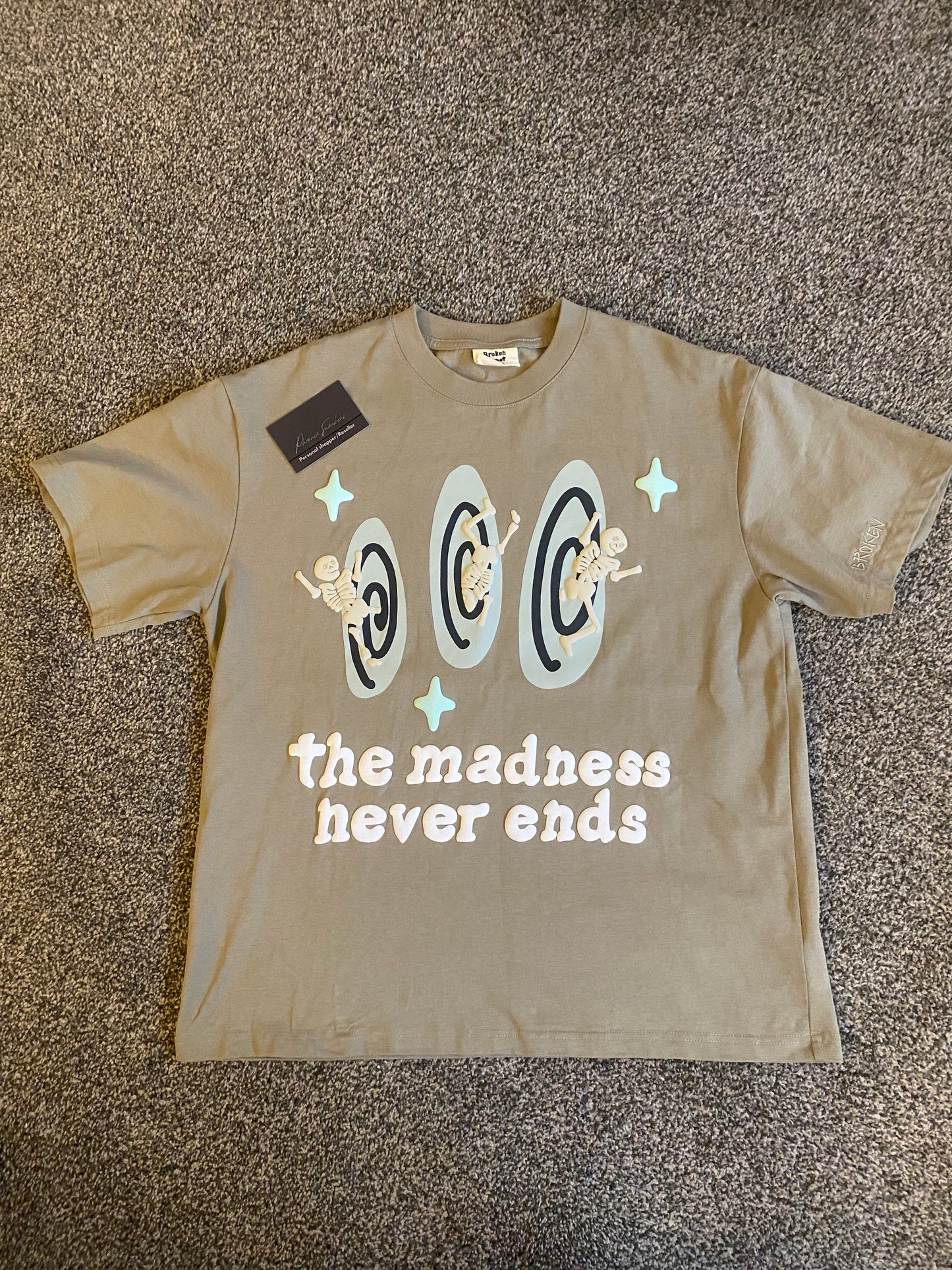 Broken Planet 'the madness never ends' t shirt beige
